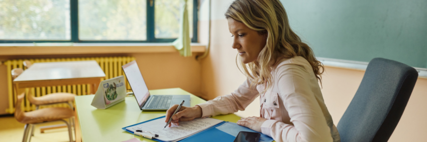 Content teacher sitting at her desk