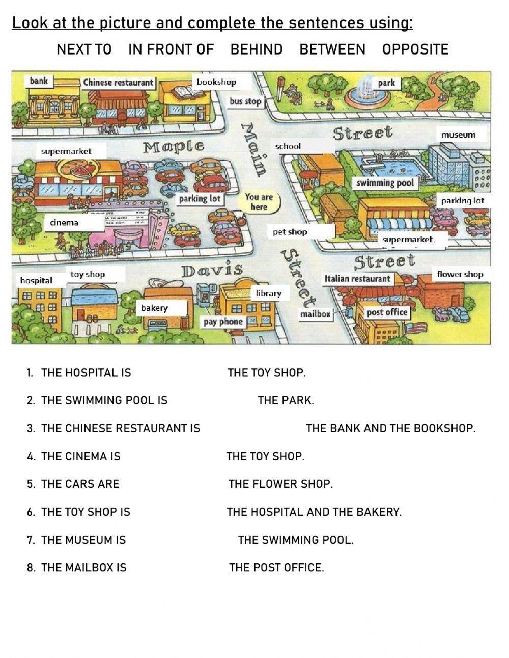 THE CITY - prepositions of place